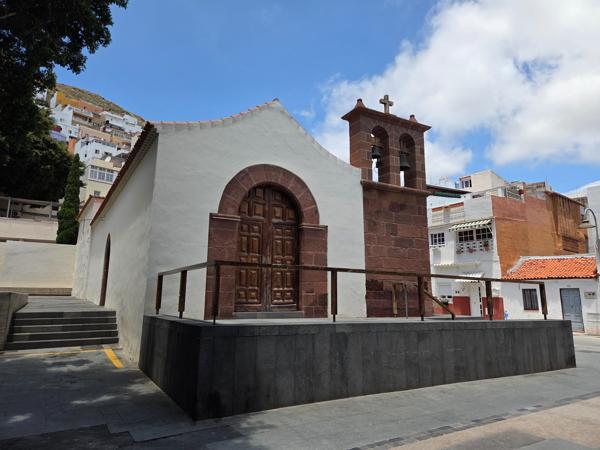 San Andrés church facade with bell tower